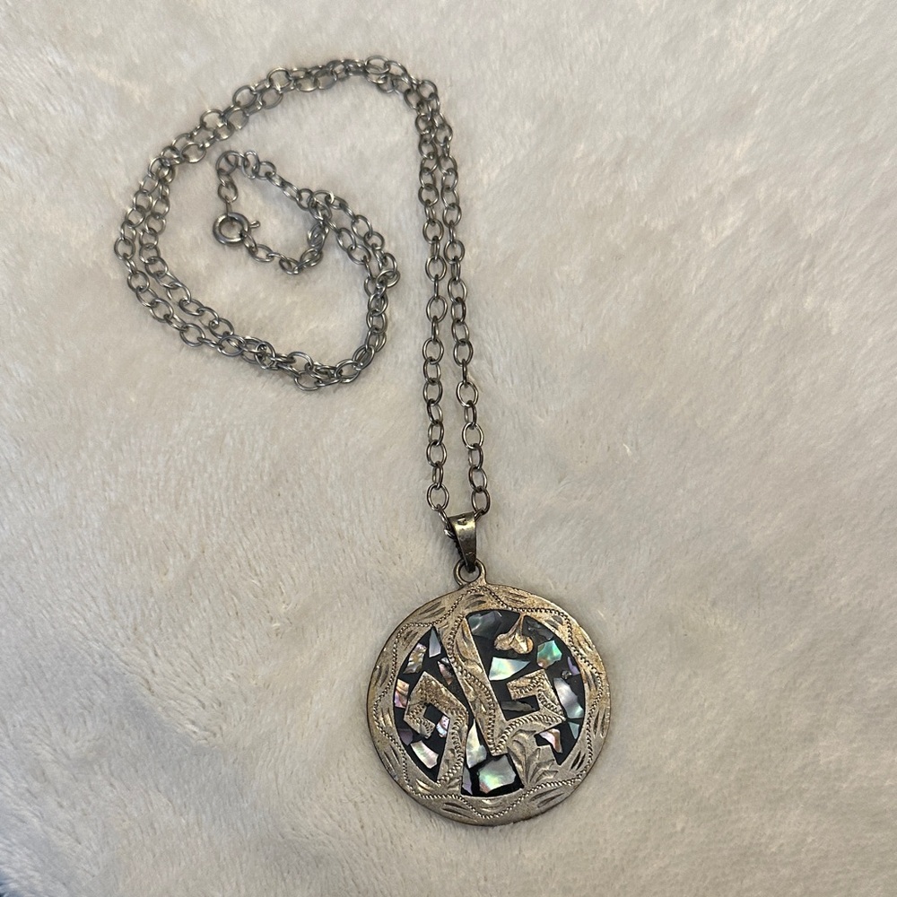 Silver double-sided Pendant Necklace with Abalone and turquoise Inlay.